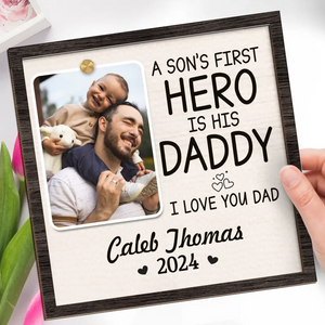 Custom Photo A Son's First Hero Is His Daddy - Family Personalized Custom 2-Layered Wooden Plaque With Stand - Gift For Dad